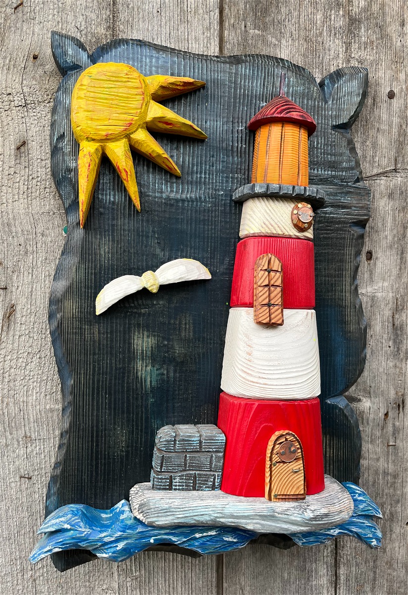 FARO in legno intagliato e decorato a mano.